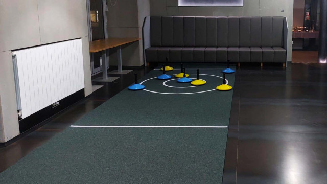 Indoor curling na koberci